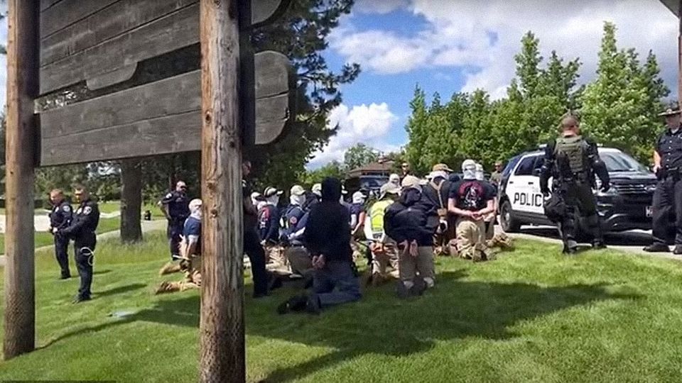 31 people with ties to white supremacy group arrested for conspiracy to riot after informant tipped them off