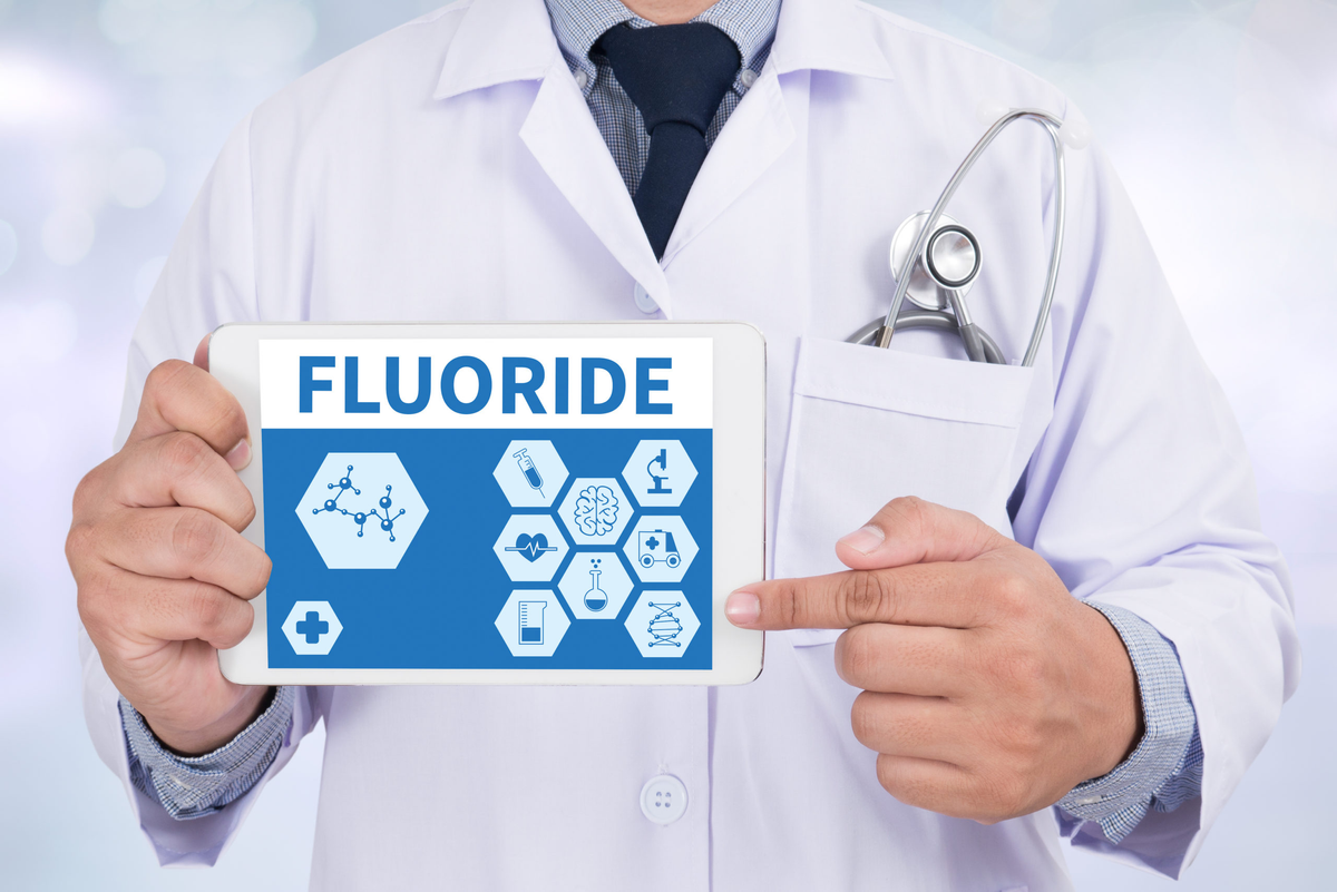 U.S. government report finds that fluoride levels twice the recommended amount might lower kids' IQs